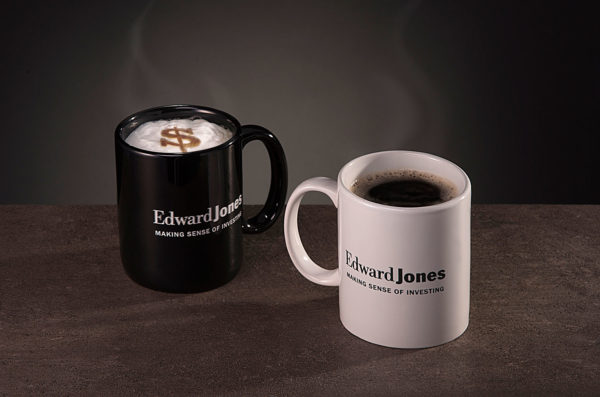 Edward Jones coffee mugs with dollar sign visible in the foam of one of the coffees
