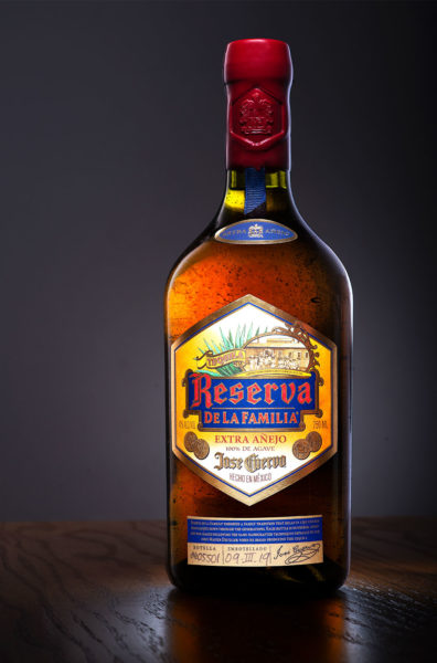 Jose Cuervo Reserva Extra Añejo bottle on a wooden table