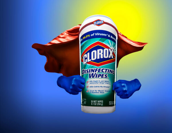 conceptual photograph of Clorox wipes as a super hero with a red cape