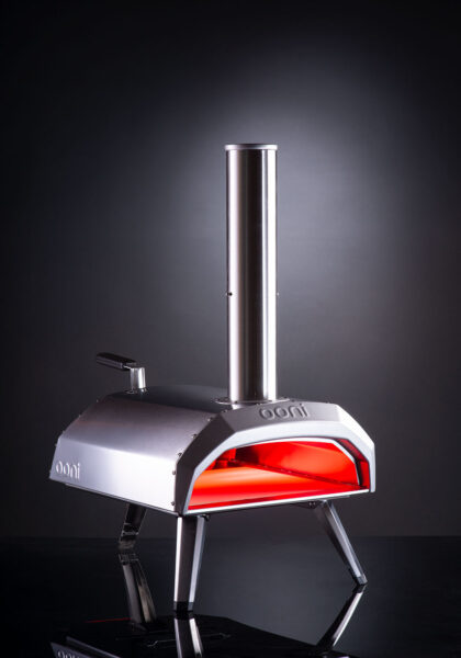 Stainless steel OONI Pizza Oven showing the open front side